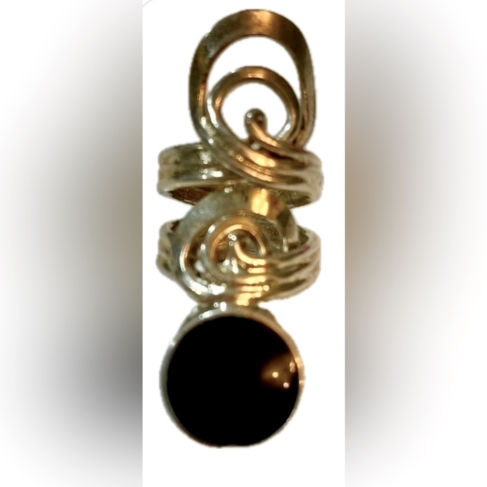 Stainless Steel ring, made w/ Oneida Fork. Crafted into a ring with black onyx. 